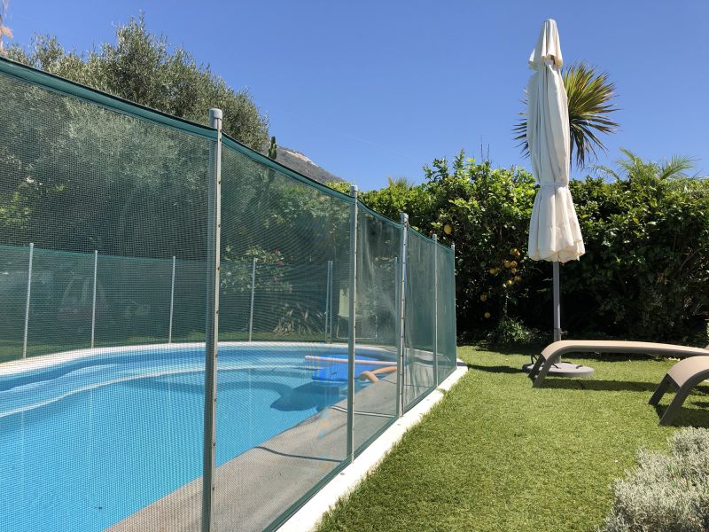Pool Area with Mesh Safety Barrier